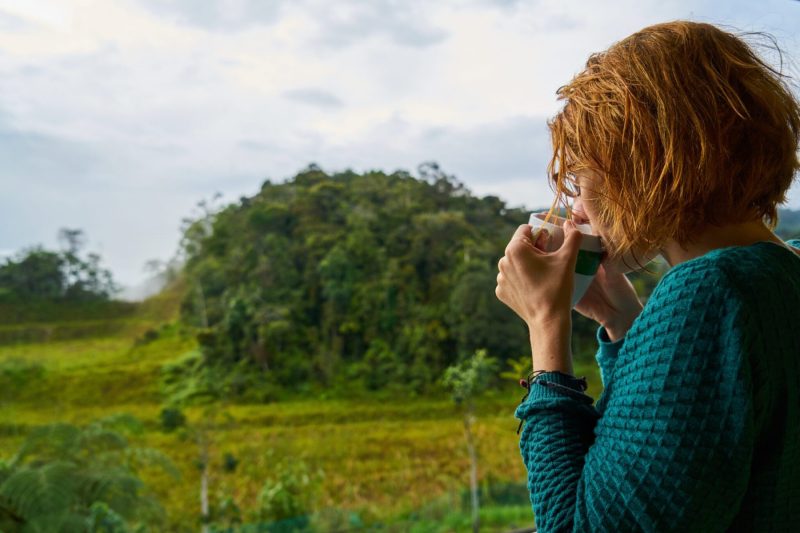 mature woman sipping coffee