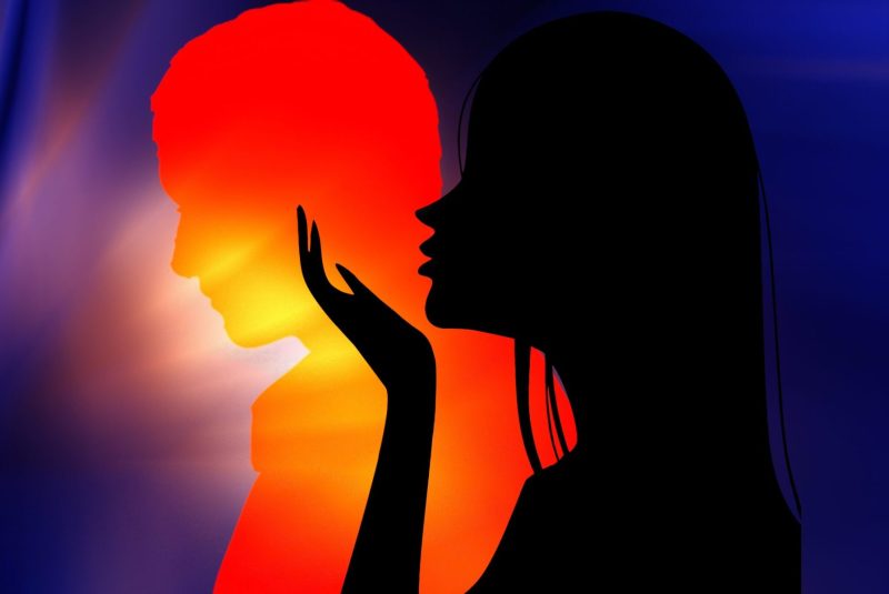 fantasy picture of woman blowing a kiss pass silhouette of man slideshow