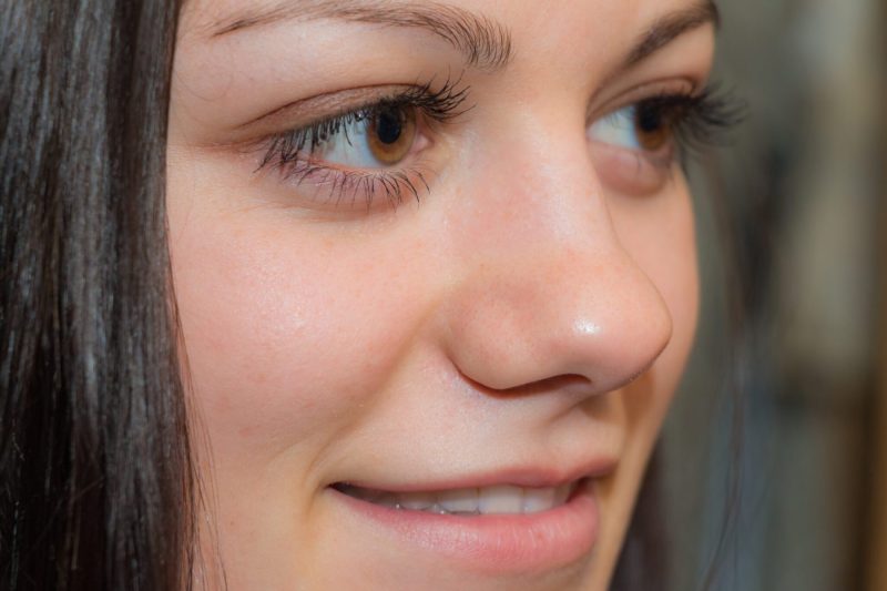 teenage girl close up looking off to side